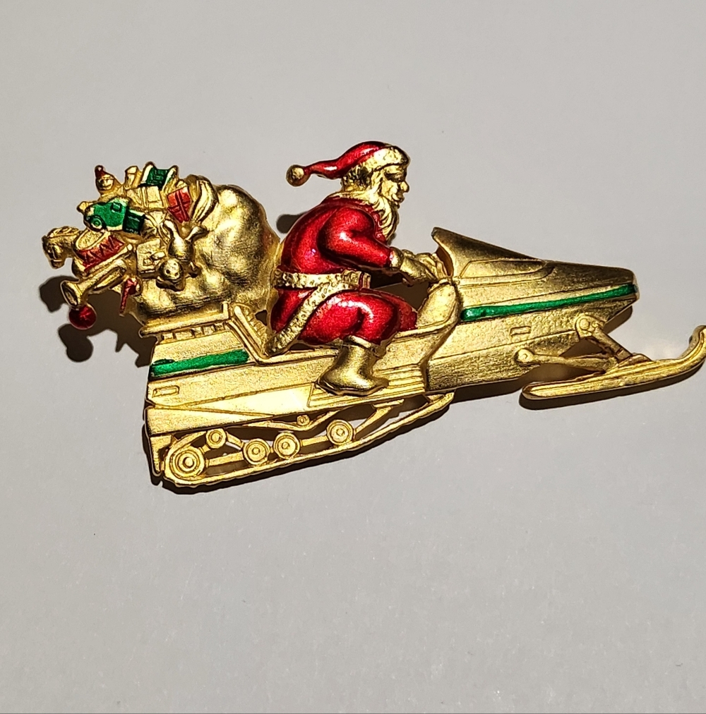 JJ Jonette Jewelry Vintage Christmas Brooch Santa on Snowmobile Brooch Gold Tone